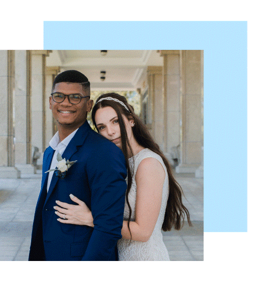 bride hugging groom from behind